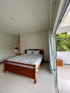 En eller flere senge i et værelse på Tenório Beach Hostel 400 MTS da praia do Tenório + 73 billeder