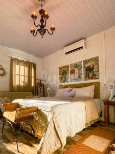 En eller flere senge i et værelse på Cabana Coração: Romantismo, Banheira e Natureza