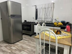 Køkken eller tekøkken på Mara e Jorge Suites Beira Mar + 11 billeder