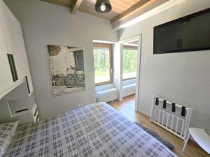 Et tv og/eller underholdning på Moda Apartments Serenella