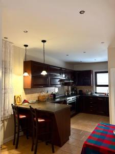 Køkken eller tekøkken på American Style Vacation Home