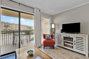 TV/trung tâm giải trí tại OV A-104 Ocean Villa - Ocean Front Resort Sleeps