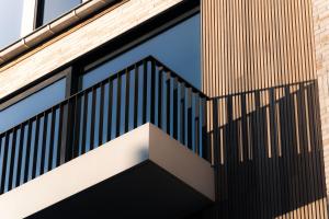 a staircase on the side of a building at X-Corner Ostend - Casselbergh Residences in Ostend