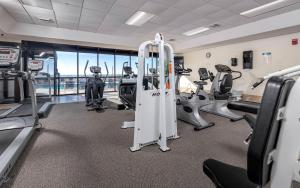 a gym with treadmills and elliptical machines at Phoenix X 304 in Orange Beach
