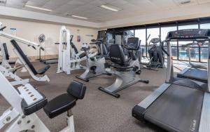 a gym with treadmills and elliptical machines at Phoenix X 304 in Orange Beach