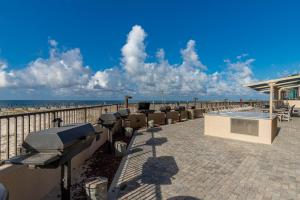 a swimming pool next to the beach at Phoenix X 304 in Orange Beach