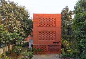 a red building with the word after on it at ONEOFF X ASSI - A Boutique Homeotel in Varanasi