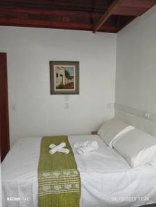 Postel nebo postele na pokoji v ubytování Apartamento com Quintal - Ar Cond - Ótima Localização