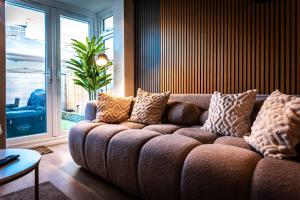 Et opholdsområde på Open Mind Property - 4 BR, Hot Tub & Free Parking