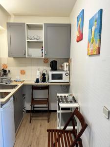 Kuchyň nebo kuchyňský kout v ubytování Le 26 Deauville