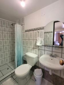 Et badeværelse på HOTEL HUAYNAPATA Pardo