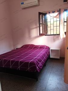 En eller flere senge i et værelse på La Casita de Felipe