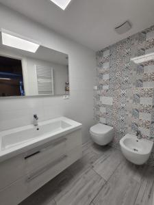 Koupelna v ubytování Apartment Ski Marilleva 1400