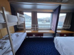 Postel nebo postele na pokoji v ubytování Apartment Ski Marilleva 1400 + 34 fotografií