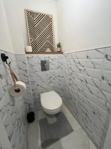 Et badeværelse på appartement 3 chambres confortable + 34 billeder