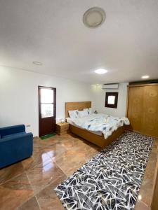 En eller flere senge i et værelse på Yellow House on the Nile