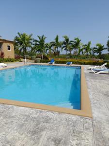 Bazén v ubytování Serene Hideaway Guesthouse in Gated Stonebrook Manor nebo v jeho okolí