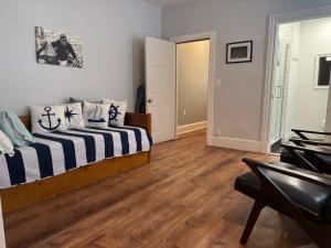 En eller flere senge i et værelse på President's Residence