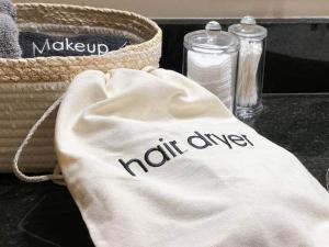 a white towel with the words north one use on it at Cozy 1Bdrm•Self Check-in•Downtown in Salt Lake City