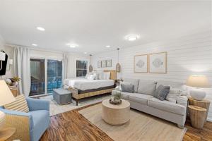 a living room with a bed and a couch at Grandy 30A in Inlet Beach +22 photos