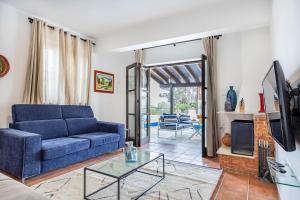 Et tv og/eller underholdning på Stroumpi Private Pool Villa