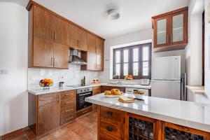 Køkken eller tekøkken på Stroumpi Private Pool Villa