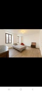 Postel nebo postele na pokoji v ubytování Appartement avec deux chambres et salon de massage