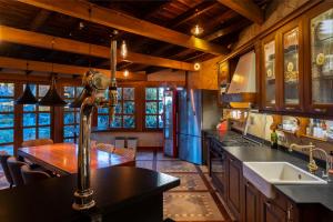a kitchen with a table and a counter top at Villa Serenitas in Arona