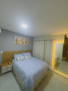 Giường trong phòng chung tại Maragogi-Peroba Ville Residence1