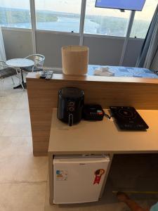 Nhà bếp/bếp nhỏ tại Paiva Home Stay com cama King e cozinha