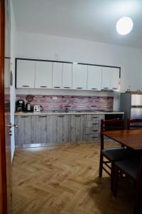 Køkken eller tekøkken på Villa Apollonia Guest House