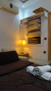 Postel nebo postele na pokoji v ubytování شقة الفن Art Apartment