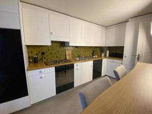 Køkken eller tekøkken på Cara Nima Schwyz