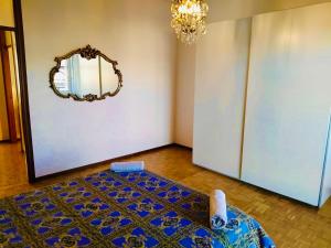 En eller flere senge i et værelse på Charming Central Relais