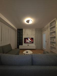 Et tv og/eller underholdning på Poki's Luxury Apartmens