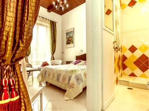Postel nebo postele na pokoji v ubytování Il Veliero B&B