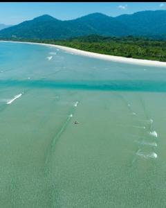 an aerial view of a beach in the ocean at Picinguaba Beleza Intocada in Ubatuba