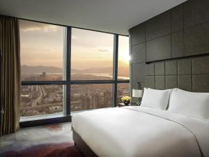 Postel nebo postele na pokoji v ubytování Sofitel Kunming + 153 fotografií