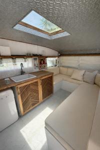 a small room with a kitchen and a sink at My Island Home Vanuatu in Eton +43 photos