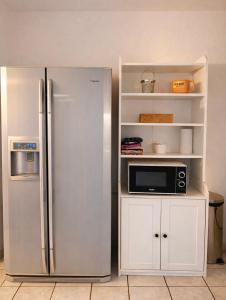 Kuchyň nebo kuchyňský kout v ubytování Maison à Beaune