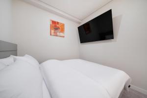 TV/trung tâm giải trí tại Alma Hotel