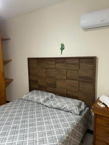 En eller flere senge i et værelse på Duplex em Praia do Forte a 50m da vila + 13 billeder