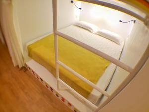 ajar view of a bunk bed in a room at Ringo's Foyer in Melaka
