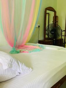 En eller flere senge i et værelse på sisi place