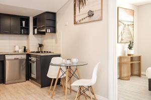 Køkken eller tekøkken på Bay Village Dunsborough