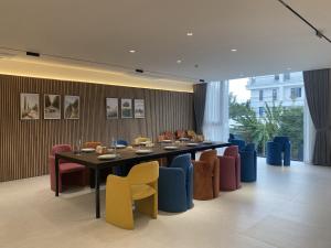 a meeting room with a long table and chairs at TS Villa in Danang +32 photos