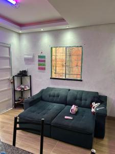 Khu vực ghế ngồi tại Casa com dois quartos no bairro Aliança com Deus