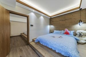 En eller flere senge i et værelse på Zhangjiajie Hotel-Free airport pick-up