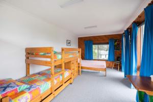 En eller flere senge i et værelse på Seaview at Gannett