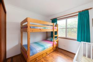 En eller flere senge i et værelse på Seaview at Gannett